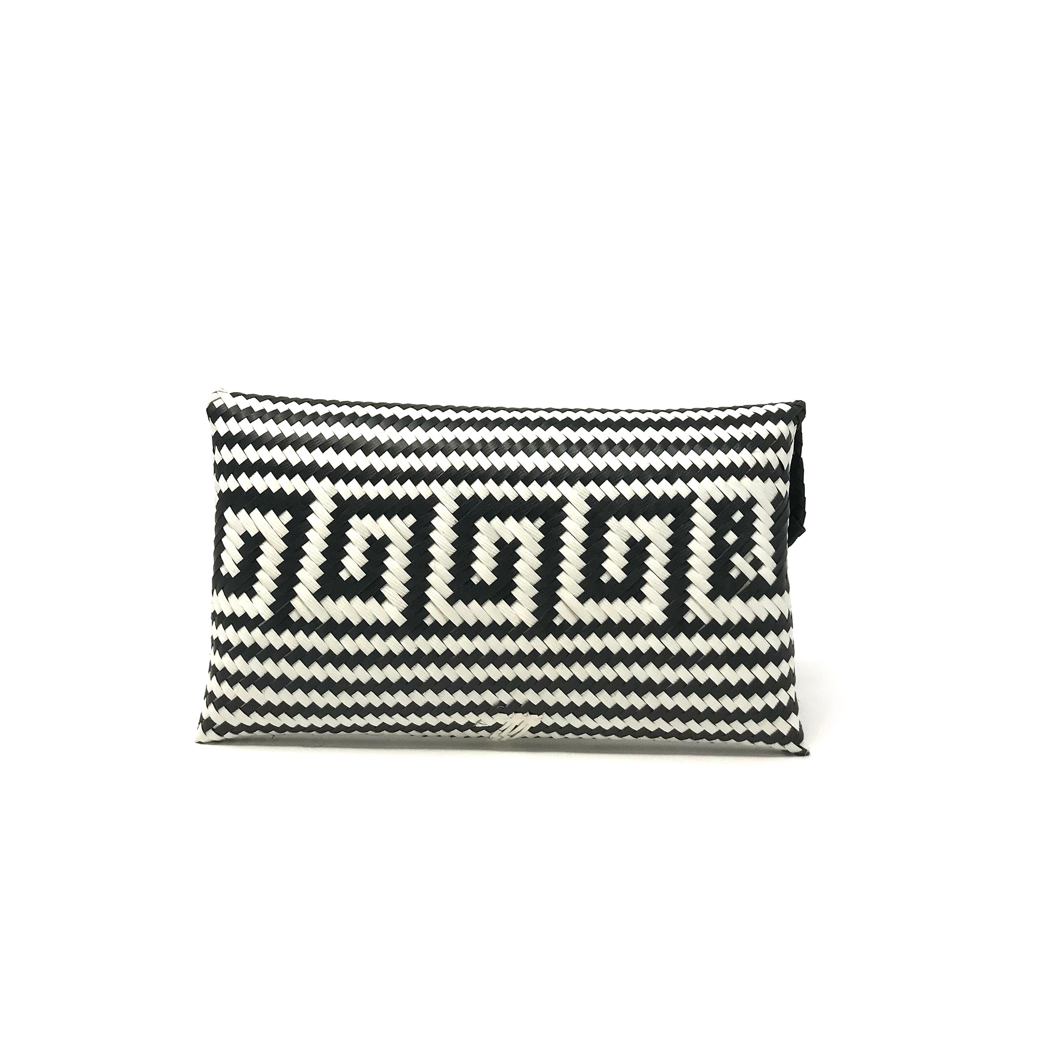 Black and white clutch facing backwards.