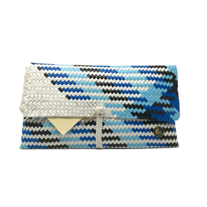 Handmade blue, black and white clutch facing the front.