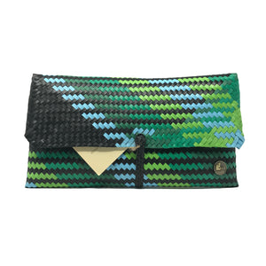 Handmade green, blue and black clutch facing the front.