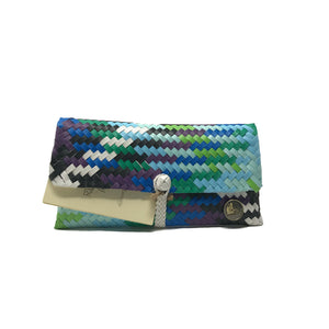 Handmade blue, green and black wristlet facing the front.
