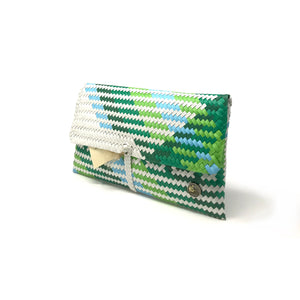 Green, blue and white clutch at a 45-degree angle.