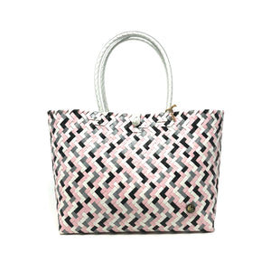 Pink, black and white medium size tote bag facing the front.