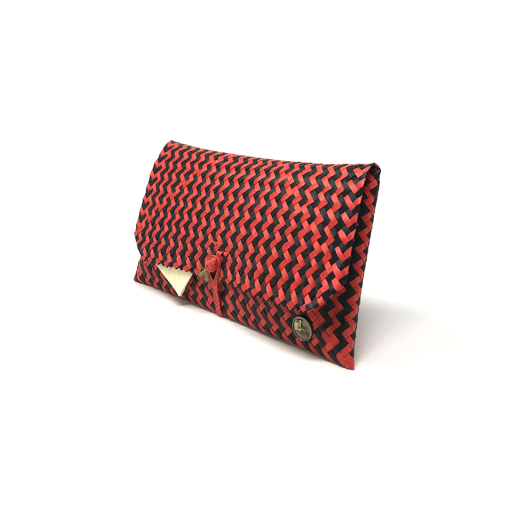 Red and black clutch at a 45-degree angle.