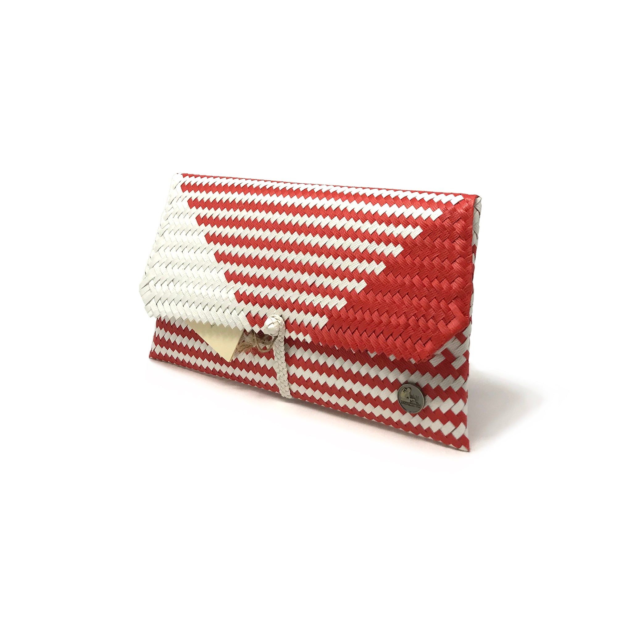 Red and white clutch at a 45-degree angle.