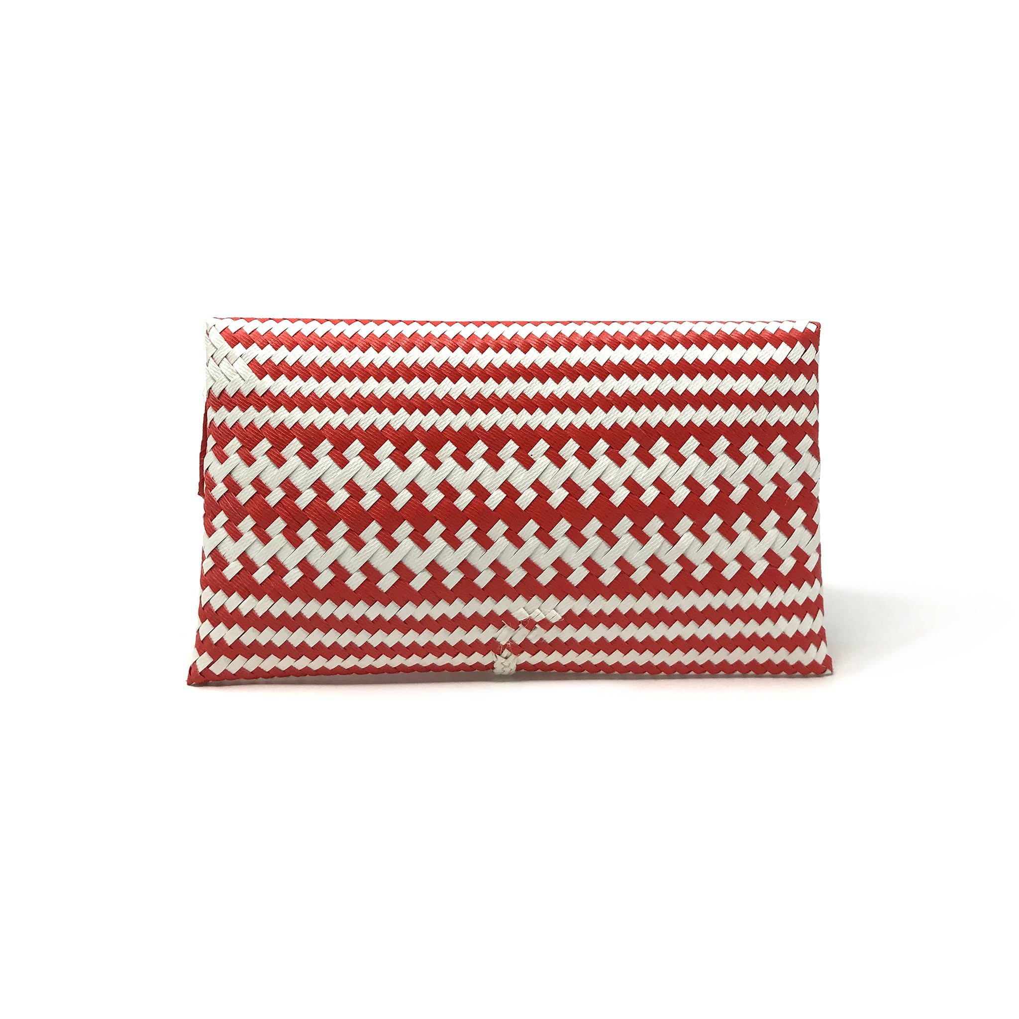 Red and white clutch facing backwards.