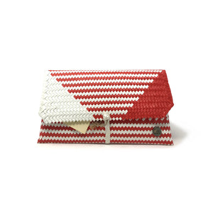 Handmade red and white clutch facing the front.
