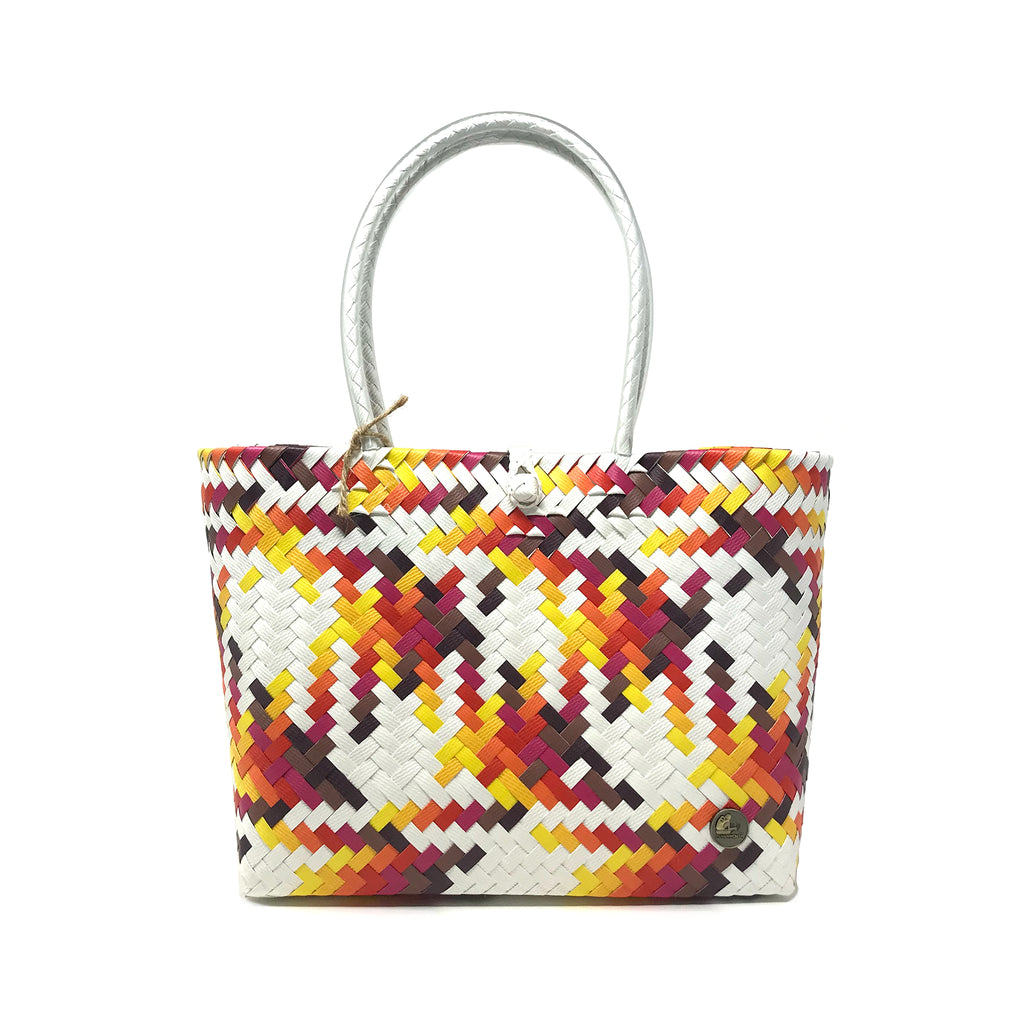 Handmade red, yellow and white small size tote bag facing the front.