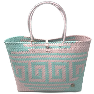 Pink and turquoise medium size tote bag facing the front.