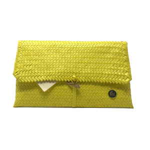 Handmade yellow clutch facing the front.