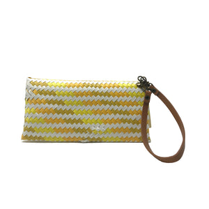 Yellow, ochre and white wristlet facing backwards.